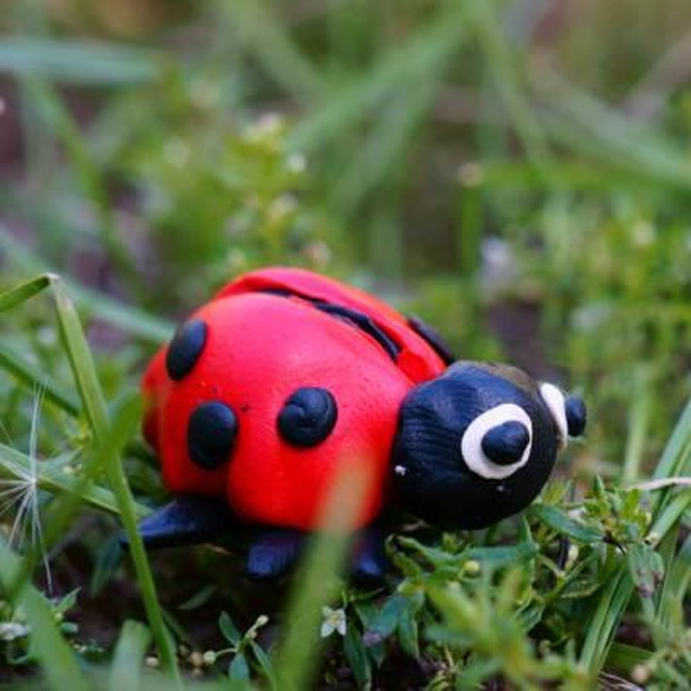 Clay Ladybug in the Grass.