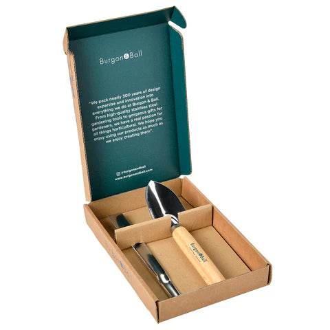 Gift box for gardeners including a trowel and widger