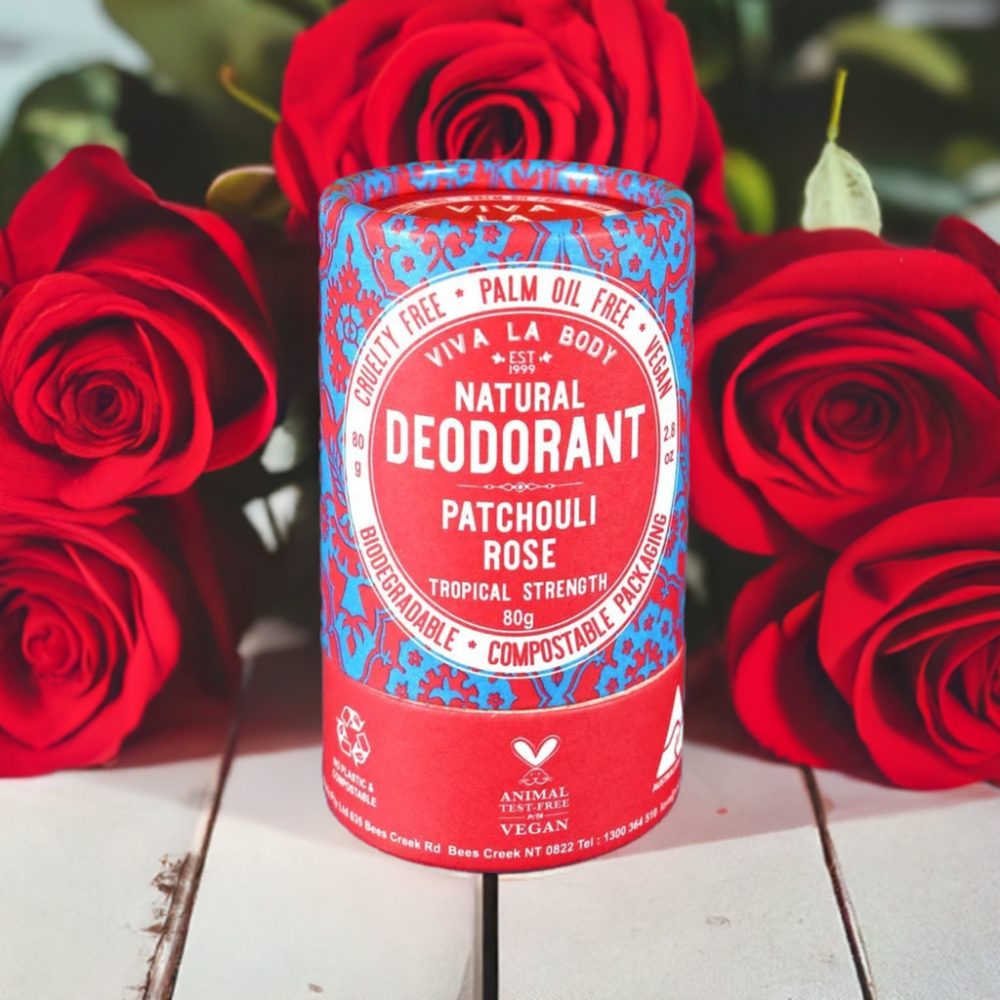 rose deodorant with roses behind it